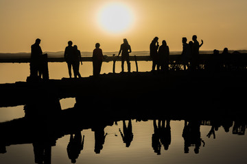 Fototapeta na wymiar Silhouette and Reflection on calm water in Fatnas Island , Siwa Egypt
