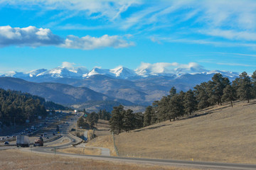 Interstate highway 70 heading west towards the Rocky Mountains of Colorado.