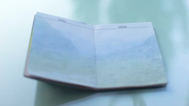 Customs officers hand stamping seal in passport, travelling abroad, template
