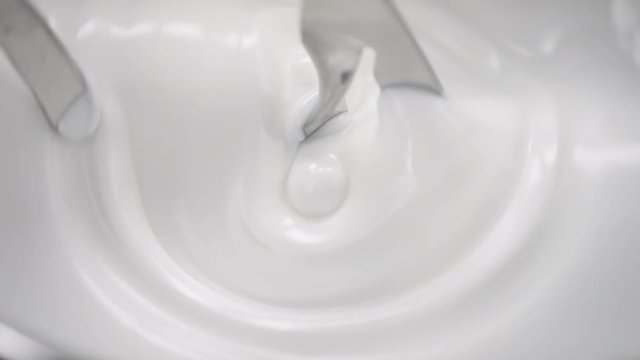 Blender whistles white cream in the lab