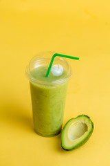 healthy drink to relax and calm yourself down. isolated yellow background.