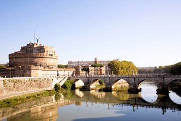 View on the famous Castel Sant Angelo and the bridge over the Tiber river in Rome, Italy. Set in...