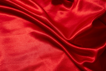 Luxury red satin smooth fabric background for celebration, ceremony, event invitation card or advertising poster