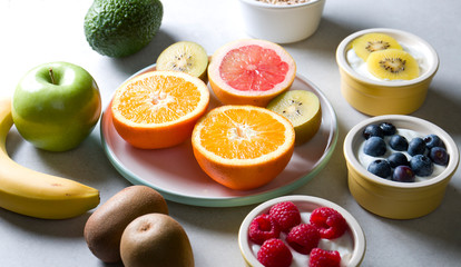 Healthy eating. Composition of fresh fruit with natural yoghurt.