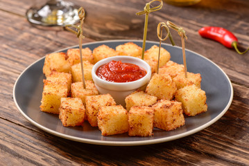 Tapioca squares and pepper jelly