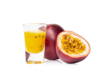 Passion fruit and juice isolated on white background.