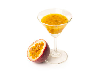 Passion fruit and juice isolated on white background.