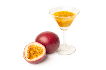 Passion fruit and juice isolated on white background.