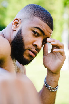 Portrait of a man sitting outdoors
