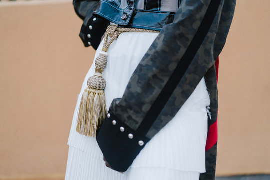 Close up of woman with tassel belt