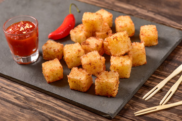 Tapioca squares and pepper jelly
