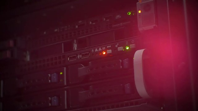 red and green lights flash on the server.