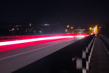 Obraz premium Car lights in a night background, long exposition
