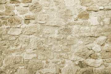 Old beige stone wall background texture - 241759381