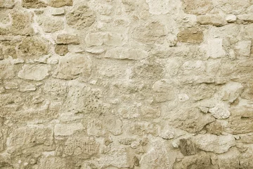 Foto op Plexiglas Oude beige stenen muur achtergrondstructuur © issalina