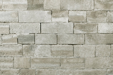 Old grey stone wall background texture