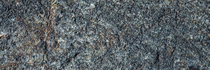 surface of the granite stone is gray.