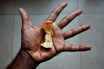 Apple core on a hand