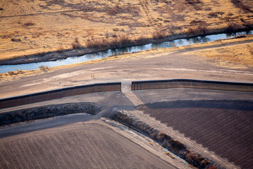 Aerial view of the US/Mexico border and border fence, Texas, USA