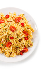 Pasta with vegetables on wooden table
