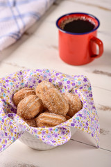 Churro bowl and black coffee cup