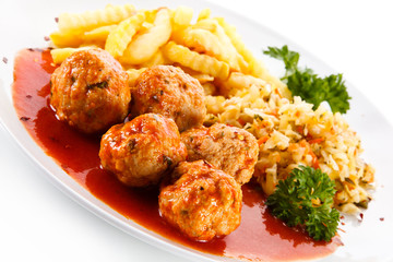 Meatballs with french fries and vegetables