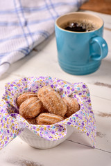 Churro bowl and black coffee cup