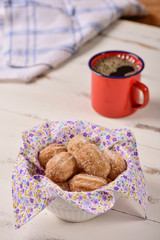 Churro bowl and black coffee cup