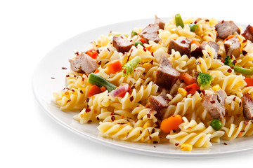 Pasta with beacon and colorful vegetables