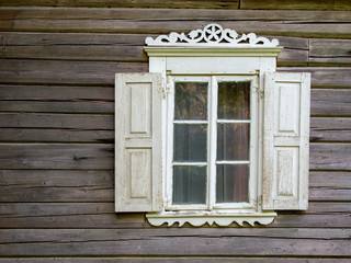 Wooden wall with opened window