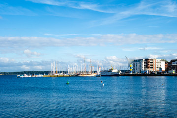 Obraz premium Port of Eckernförde with ships in Schleswig-Holstein at blue sky, Germany