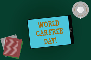 Word writing text World Car Free Day. Business concept for Environment protection campaign avoid pollution Tablet Empty Screen Cup Saucer and Filler Sheets on Blank Color Background