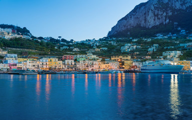 Fototapeta na wymiar Beautiful sunset view of Marina Grande, Capri island, Italy