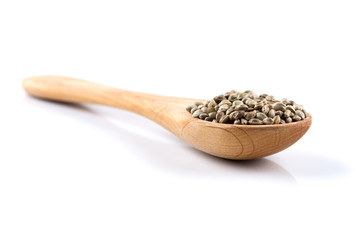 Cannabis Hemp seeds in spoon on white