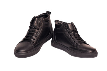 Leather black winter boots for men on a white background comfortable and warm in the cold, do not get wet in the rain