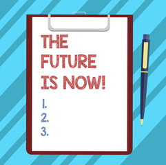 Text sign showing The Future Is Now. Conceptual photo Act today to obtain what you want tomorrow planning Blank Sheet of Bond Paper on Clipboard with Click Ballpoint Pen Text Space
