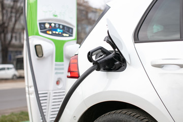 electric car charging at a public supercharger