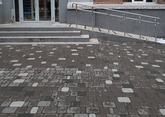 entrance to city store with special ramp for support disabled people