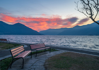 Fototapeta na wymiar Sunset at the embankment of Ascona on Lake Maggiore, Ticino canton of Switzerland