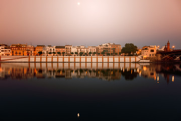 Obraz premium Architecture of Seville along Guadalquivir River