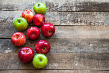 Fresh apples on wooden background