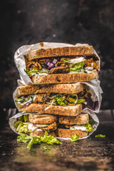 delicious gyros sandwich in paper bag with salad