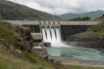 The Clyde hydroelectric power dam spilling large amounts of excess water. Clyde, Otago, New Zealand.