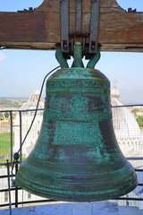 Obraz premium Day view of the bells at the top of the Leaning Tower of Pisa campanile in Tuscany, Italy