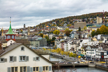 ZURICH, SWITZERLAND - OCT 130th, 2018: Classic beautiful and colorful swiss cityscape or landscape at rainy autumn day - 241781111