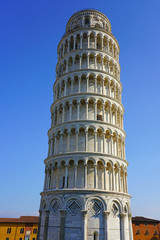 Day view of the Leaning Tower of Pisa campanile in Tuscany, Italy