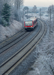 German train traveling on a cold morning day