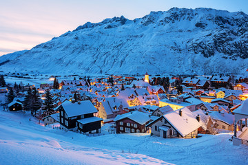 Andermatt village in swiss Alps mountains, Switzerland in winter - obrazy, fototapety, plakaty
