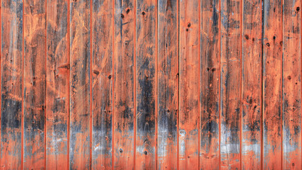 Old wooden wall in Living Coral tone. Wooden Background with texture amazing texture and chaotic color pattern. Trendy pastel. 