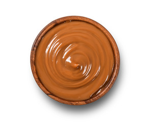 Dulce de leche bowl isolated on white